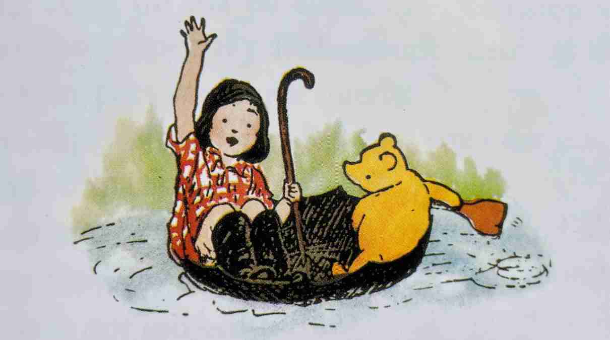 Christopher Robin y winnie the pooh navegan en paraguas