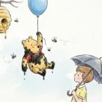 Winnie the Pooh colgado de un globo azul rodeado de abejas negras.
